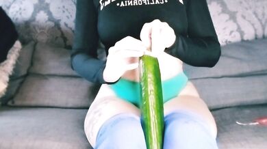 Irish girl stretches her pussy with a cucumber