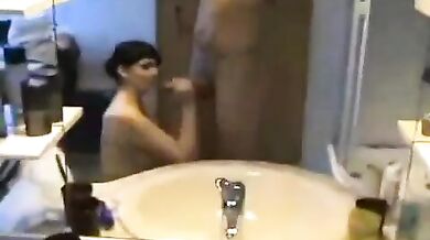 hot amateur bathroom scene : shower behind , against table , final hand job porn