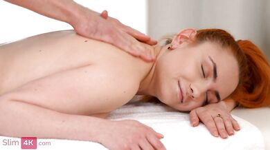 Attractive redhead creampied after ardent sex with masseur