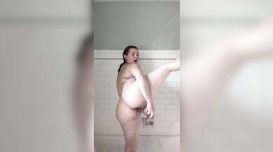 Thick babe gets her clothes wet in the shower, toys and soap!