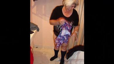 Granny squeezes her giant breasts with big nipples