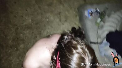 Naked in a public park sucking dick