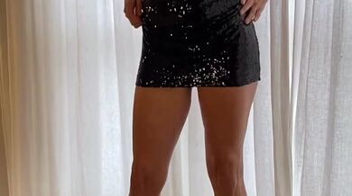 Hot GILF looks just as good in the dress as she does out of it!