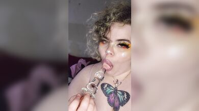 Goth GF sucks on toy for you