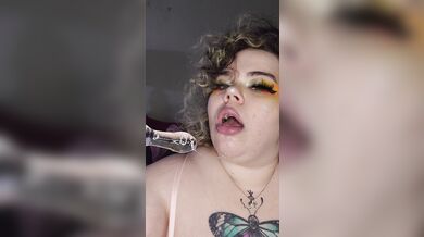 Goth GF sucks on toy for you