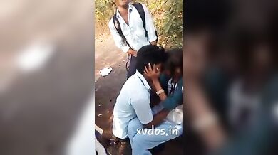 Collage Girl Having Kissing Session With Friend Infront Of Other Friends