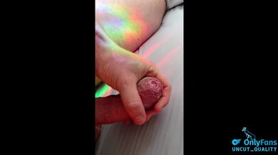 slow foreskin play on an white large uncut cock