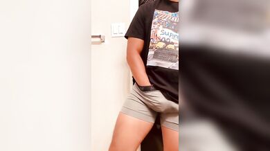 Guy plays with his cock after working out