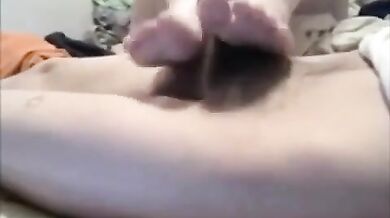 Footjob With Cumshot On Toes Then She Licks The Cum Off Her Own Toes porn