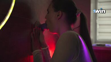 Brunette Neon Bliss: Tattooed Temptation in the Bathtub