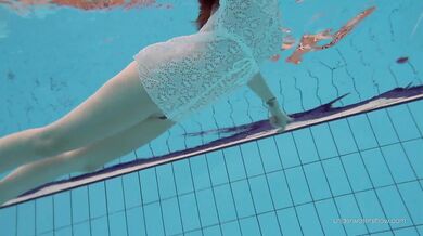 Tight brunette Russian babe Katy Soroka swims