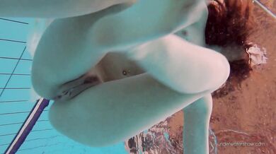 Tight brunette Russian babe Katy Soroka swims