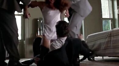 Brunette Lena Olin in lingerie shows off her small boobs