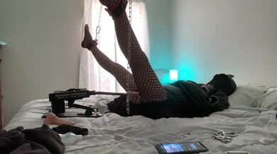 Mistress’s in straight jacket being fucked by the machine and sub