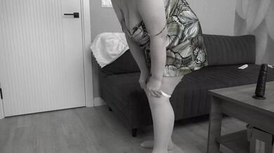 A mature BBW milf with big saggy tits and a hairy pussy gets dressed.