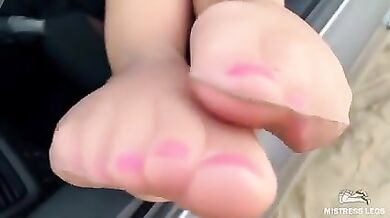 Hey footboy, instead of rubbing my windshield, you better clean my nylon feet!