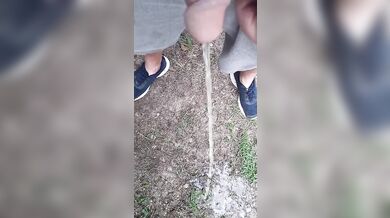 Pissing into the wind during a summer storm splashing all over me