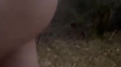 Crazy long walk in fishnets and nude onto a lit street