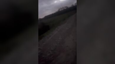 Crazy long walk in fishnets and nude onto a lit street
