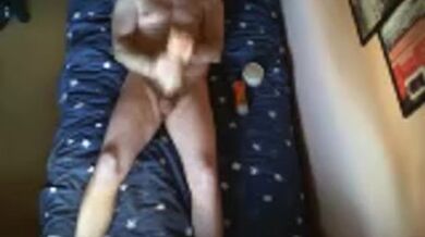 LongJohn0Hara lying on the bed fucking a tight micro rib fleshlight