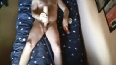 LongJohn0Hara lying on the bed fucking a tight micro rib fleshlight