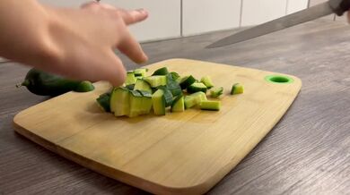 Cute teen fuck her ass with a big cucumber