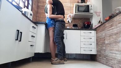 she talks to the cuckold on the phone while her lover kisses her