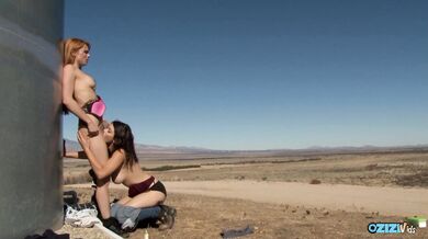 Big titted dykes are having a wonderful lesbian action including scissoring Outdoor under the clear