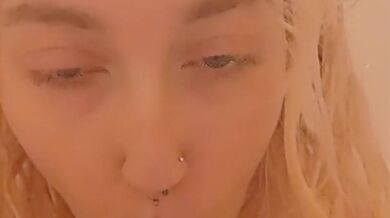 Kitten gives dildo head in the shower hot and steamy