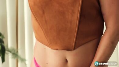 A Petite Blonde Named Bella Bares Her Body And Pussy