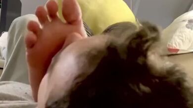 Smelling girlfriend’s feet while she studies