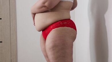 BBW shakes stuffed belly and fat ass in panties. Fetish.