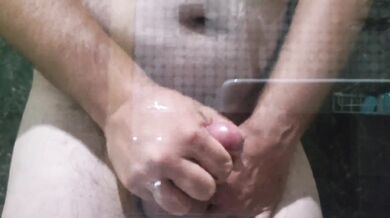 Jercking on the shower, with a cum on a glass wall