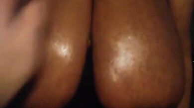 Oiled up black granny boobs