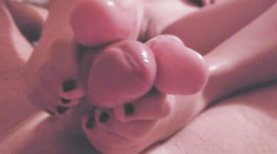 perfect footjob toejob with her perfect cute toes black nail polish and cums hard