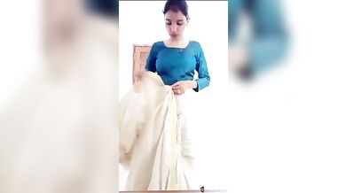 Desi Young Girl Stripping Saree