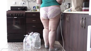 bbw housewife with big belly and big ass in the kitchen in panties