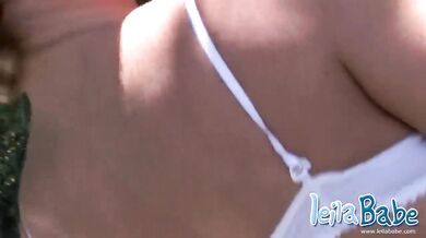 Stripteasing MILF girl touches herself in public outdoors