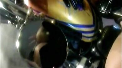 Brunette with big boobs on bike