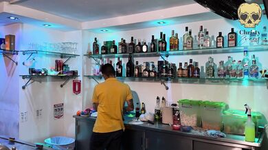 Waiting for my husband in a swinger bar I end up fucking the bartender without a condom and he comes