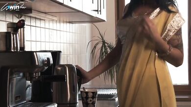Yellow Saree Bollywood Bhabhi gets fucked in the kitchen