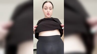 Beautiful brunette shakes her half-naked big tits