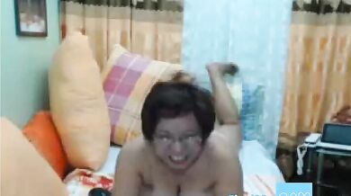 Filipina Granny with Glasses Shows Her Tits on Webcam