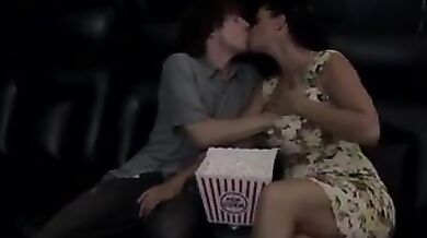 Busty Stepmother Making An Handjob To Her Stepson In The Cinema