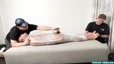 Playfully Endulging A Mummified Pup
