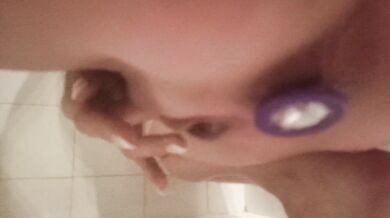 Squirting explosion - She play with a dildo in the shower while having a plug inside!