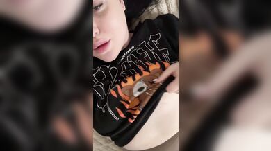 Sexy brunette without underwear squeezes her big tits