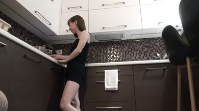 Sexy and Horny Braless Brunette Petite Girlfriend in the Kitchen in a Very Tight Dress to flash pussy and ass