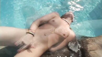 Little Summer gets horny in pool