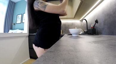 Hot Sexy Brunette MILF Housewife at home no panties in a Cut Miniskirt to flash meaty juicy pussy